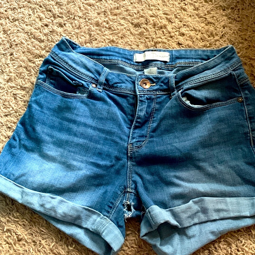Jean shorts, there is a little hole in the crotch area. Size 2